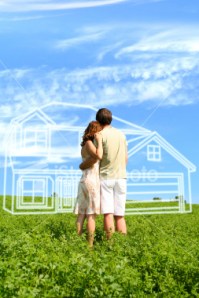 ist2_2936389-young-couple-dreaming-about-a-house